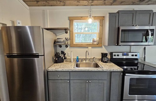 Guntersville Apartment | Tiny House Glamping Retreat- 670+ Acres Private Property on Lake Guntersville