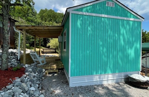 Burkesville House | Tiny house with deck and swing