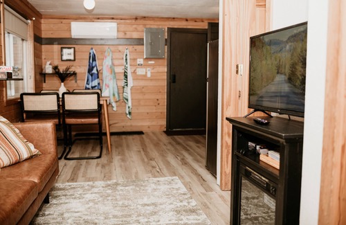 Cushing Cabin | Tiny Timber, tiny cabin with a Scandinavian flair! Sauna & plunge tub!