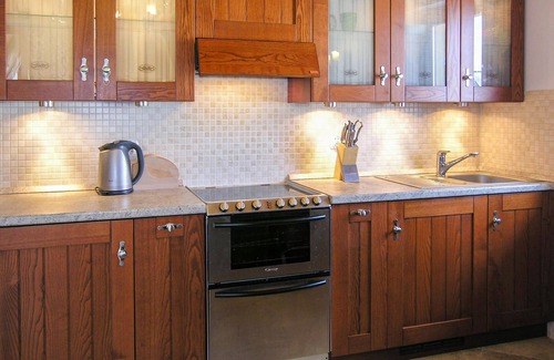 Koscielisko Apartment | To the modern vacation home belongs an enclosed natural plot.