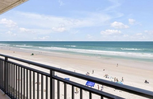 New Smyrna Beach Condo | Top floor beach front suite with 27' balcony & rooftop pool.