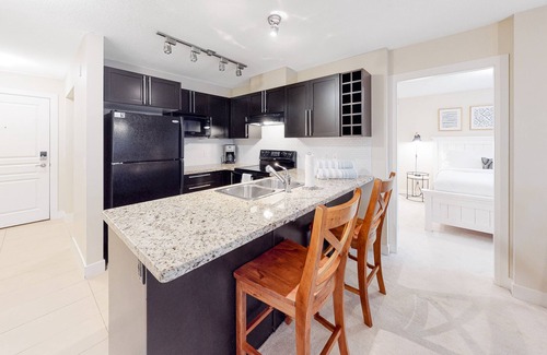 North End Condo | Top-floor condo w/fast WiFi, furnished balcony, private grill, shared pool & gym