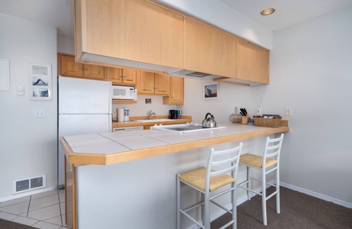 Lincoln City Condo | Top floor condo with bay and ocean views in historic Taft, Lincoln City!