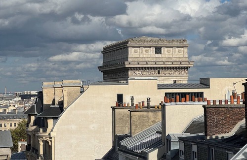 Champs-Elysees Apartment | Top floor Paris studio - view of rooftops and monuments