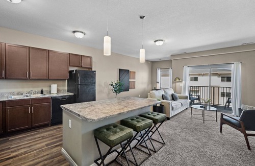 West Des Moines Apartment | Top Floor | Private Garage | Tanning, Gym & More!