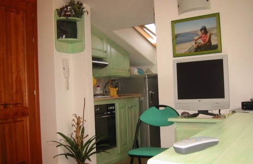 Oristano Apartment | Top floor small loft overlooking the old town near to the beach