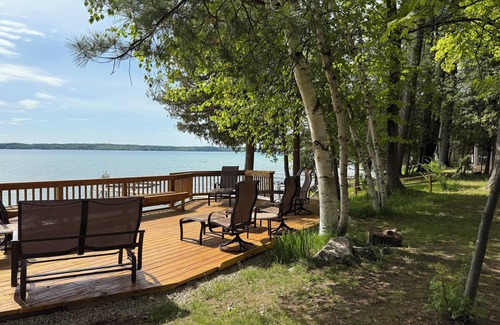 Alden Cottage | Torch Lake Exceptional Lakefront Cottage and Guest House - with Sandy Beach