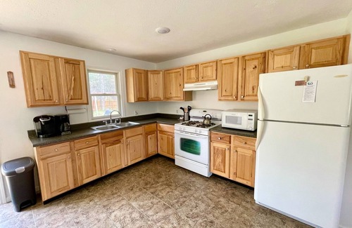 Rapid City House | Torch Lake Home: AC, arcades, game room, 3 min to Torch Lake! Bring your boat!