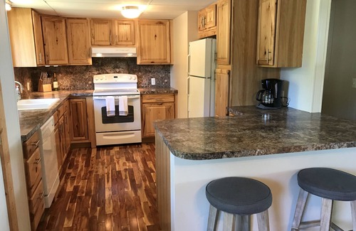 Rapid City House | Torch Lake Waterfront w/Hot Tub & Pontoon Rental