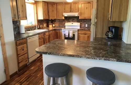 Rapid City House | Torch Lake Waterfront w/Hot Tub & Pontoon Rental