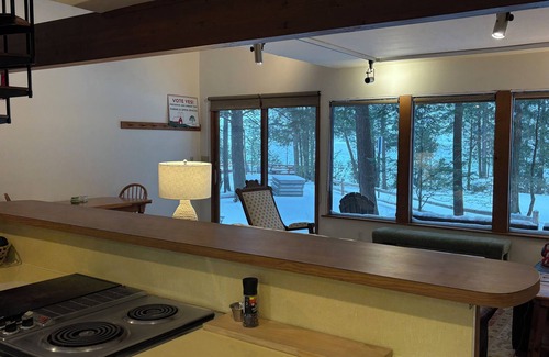 Alden Cottage | Torch lake waterfront:100 ft of sandy beach, 3-bedroom, 3-bath cottage