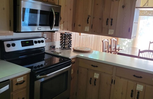 Bellaire Cottage | TorchLakeFlightDeck.com cottage with 180’ on Lakefront Waterfront Beachfront!