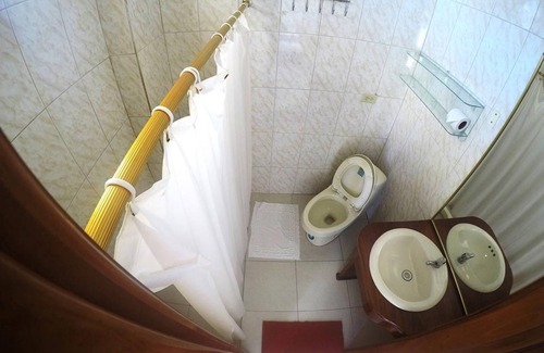 Puerto Villamil House | Tour to volcan, swim with sharks! Tripple Room Suite #4