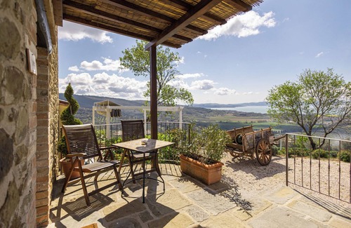 Passignano sul Trasimeno Apartment | Tower- Room with patio with beautiful lake view