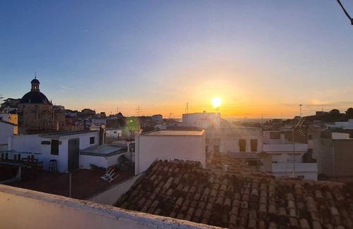 Lliria House | Town House with roof terrace and stunning views. Close to all local amenities