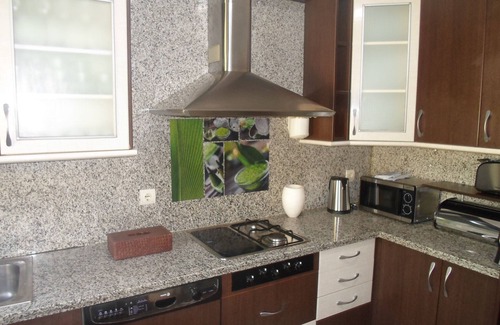 Urbanizacion Puerto de Estepona House | Town house with shared pool and stunning roof terrace, close to the beach