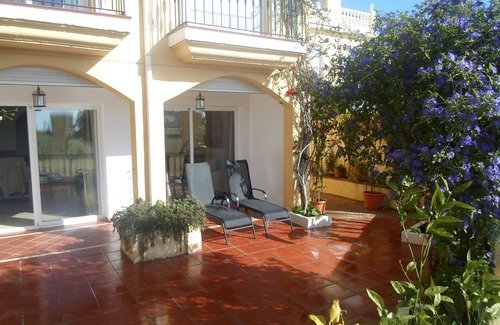 Urbanizacion Puerto de Estepona House | Town house with shared pool and stunning roof terrace, close to the beach