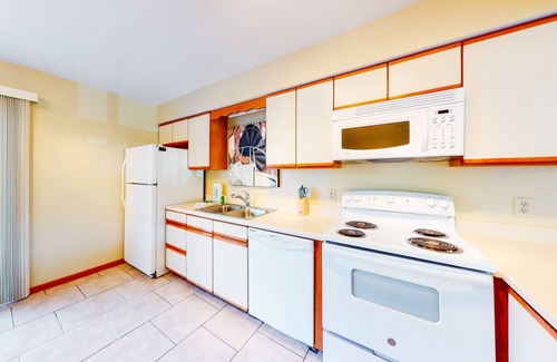 Sea Acres House | Townhome 1 block from the beach & near town with decks, shared pool/tennis