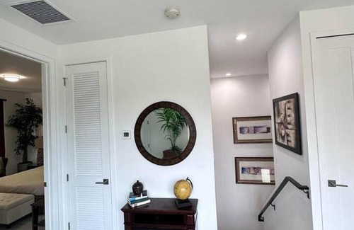Egypt Lake-Leto Apartment | Townhome in central Tampa. Efficient floor plan with kitchen and half bath on the first floor. Upstairs has generous loft/office area, two bedrooms with ensuite bathrooms. On site laundry room.