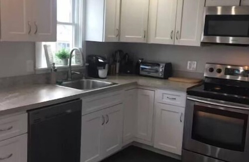 Adamsville House | Townhouse Close to Downtown Newport & Beaches