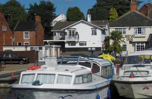 Irstead House | Tracara in Horning, riverside location sleeps 8. Family & Pet friendly.