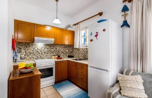 Korfalonas House | Traditional Blue house 150m from the beach with all the essentials