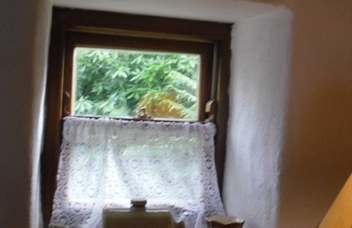 Lauragh Cottage | Traditional cosy stone cottage with sea views