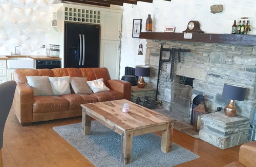 Downpatrick Cottage | Traditional Irish cottage with views of Slieve Patrick