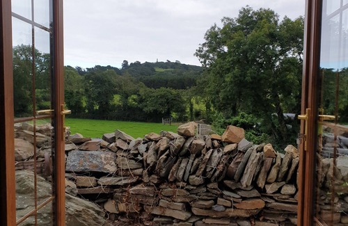 Downpatrick Cottage | Traditional Irish cottage with views of Slieve Patrick