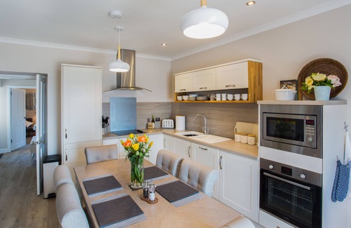 Inverness Cottage | Traditional stone built cottage, beautifully renovated,uninterrupted Sea view