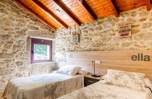Vilamea House | Traditional stone house with cozy interior.