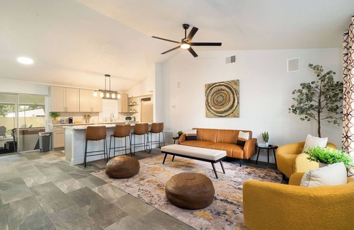Sanford House | Trailhouse Retreat - Soak in the hot tub & ride bikes to the Sanford Riverwalk!
