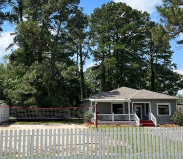 Montgomery House | Train Depot - 3 BR Home with Pool, Sand Volleyball & Pool Table