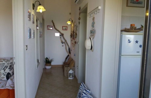 Marina San Gregorio House | Tramonto apartment, 50 m from the sea, breathtaking view, wifi, air conditioning.