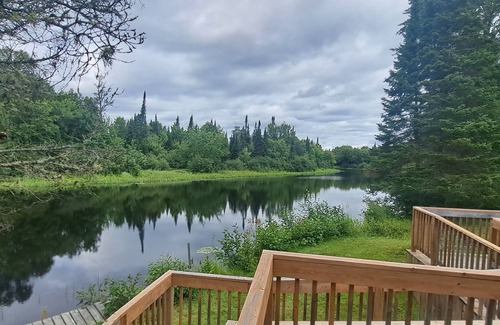 Ryerson Cottage | Tranquil, airy cottage just steps from the river with miles of boating fun!