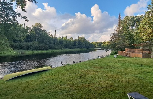 Ryerson Cottage | Tranquil, airy cottage just steps from the river with miles of boating fun!