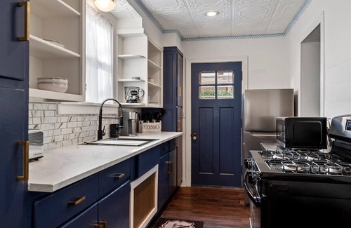 Springfield House | Tranquil cottage near hospitals with fenced backyard, fits 4 guests