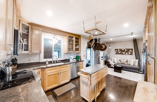 Crieve Hall House | Tranquil home with private hot tub, sunroom, den, office & lovely backyard
