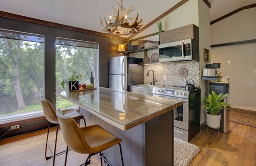 Greater Napanee Apartment | Tranquil/Private King Suite, Cozy, Riverfront w/hot tub,fireplace,firepit,trail.