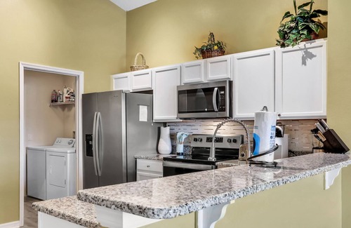 Eagle Pointe South House | Tranquil vacation home with private pool & pond located minutes from theme parks