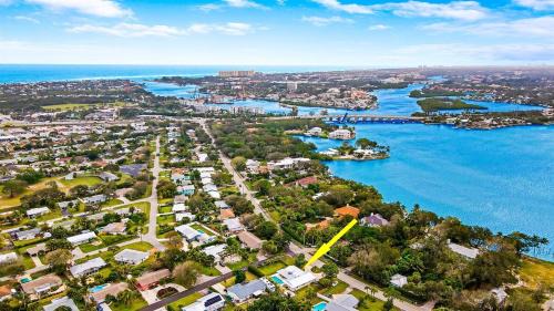 Riverside Villa | Tranquil Villa with Heated Salt Pool, Bar, & Lanai