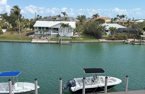 Shell Harbor Condo | Tranquil WATERFRONT 2-bedroom condo on Sanibel Island minutes to the beach!