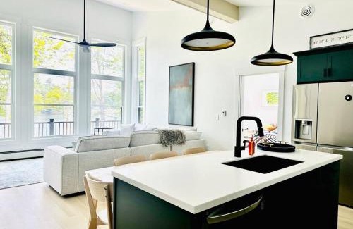 Dryden House | Tranquil Waters - Modern Lakefront Haven with Hot Tub - Explore, Relax, and Recharge! Close to UMF!