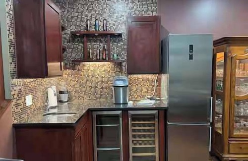 Smyrna House | Tranquil Waters: Sauna, Hot Tub, Chefs Kitchen