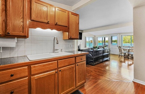 Traverse City Cottage | Traverse City's Silver Lake, DIRECT sandy beach waterfront on all sports lake.