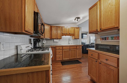 Traverse City Cottage | Traverse City's Silver Lake, DIRECT sandy beach waterfront on all sports lake.