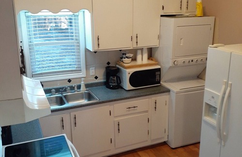 Lake Ozark Cabin | Tree house, fire pit, and walk to Bagnell Dam area.