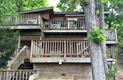 Lake Ozark Cabin | Tree house, fire pit, and walk to Bagnell Dam area.