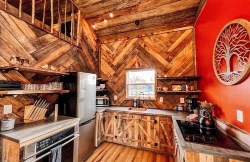 West Newton Cabin | Treehouse Hot tub on 60 acre farm near downtown