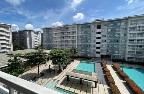 Novaliches Condo | Trees Residences Condo by Denzmar Holistay